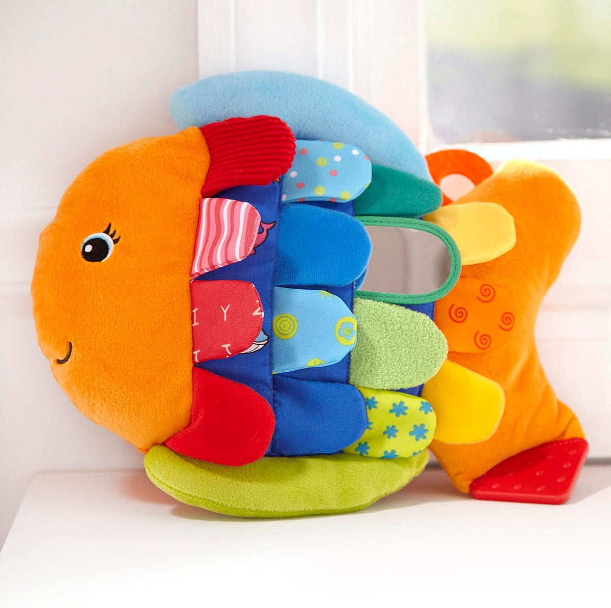 Melissa & Doug K’s Kids Flip Fish Stuffed Animal – Parent-Trusted Baby Toy with Hidden Pictures and Squeaker, No Batteries Required